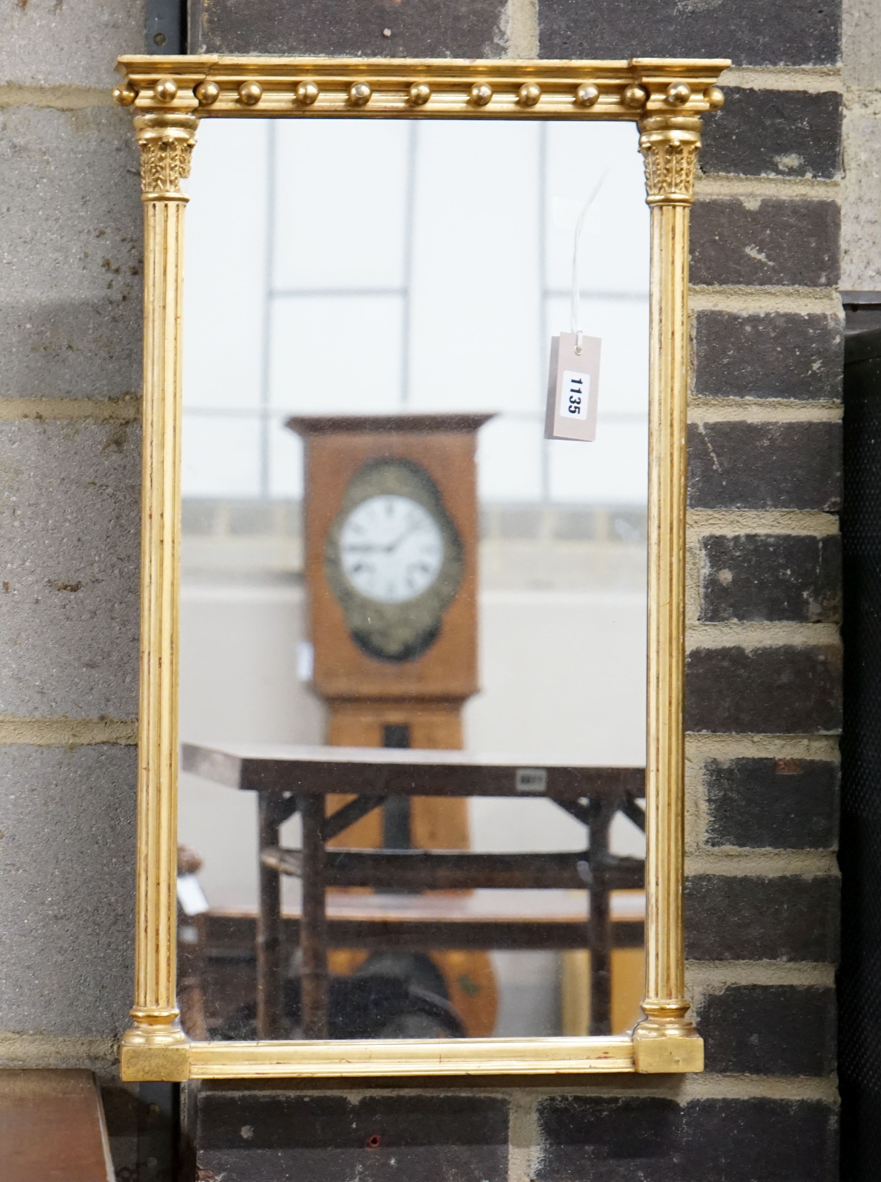 A Regency style giltwood pier glass, width 40cm, height 68cm